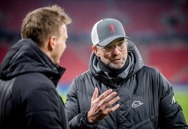 Liverpool coach Juergen Klopp and Leipzig coach Julian Nagelsmann stand together and talk UEFA Champions League Round of 16, second leg FC Liverpool RB Leipzig 2 0 10 03 2021, Puskas Arena in Budapest Hungary FC Liverpool RB Leipzig
