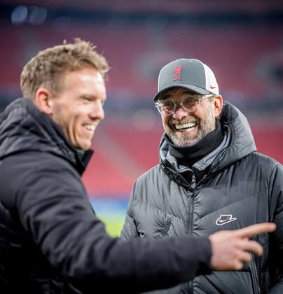 Liverpool coach Juergen Klopp and Leipzig coach Julian Nagelsmann stand together and talk UEFA Champions League Round of 16, second leg FC Liverpool RB Leipzig 2 0 10 03 2021, Puskas Arena in Budapest Hungary FC Liverpool RB Leipzig