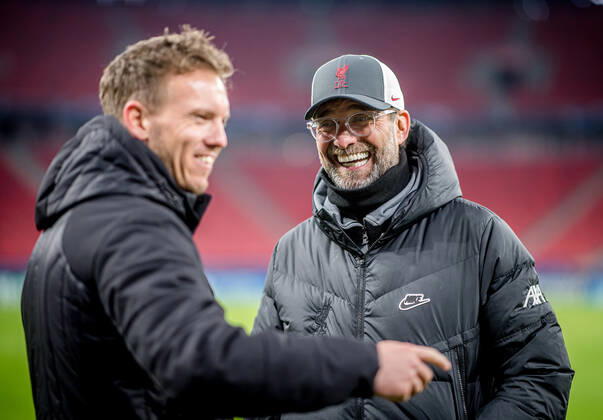 Liverpool coach Juergen Klopp and Leipzig coach Julian Nagelsmann stand together and talk UEFA Champions League Round of 16, second leg FC Liverpool RB Leipzig 2 0 10 03 2021, Puskas Arena in Budapest Hungary FC Liverpool RB Leipzig