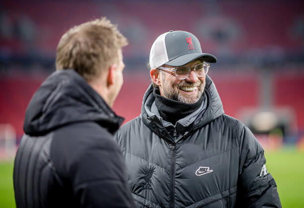 Liverpool coach Juergen Klopp and Leipzig coach Julian Nagelsmann stand together and talk UEFA Champions League Round of 16, second leg FC Liverpool RB Leipzig 2 0 10 03 2021, Puskas Arena in Budapest Hungary FC Liverpool RB Leipzig