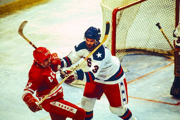 1980 Olympic Winter games, Winterspiele,Spiele, Summer games USA Ice hockey, Eishockey Ken Morrow of Team USA checks USSR player during the Men s Ice Hockey semi-final at the 1980 Olympic Winter Games. Lake Placid New York United States Copyright: xPaulxJxSutton DUOMO PCNx IH0101_106106