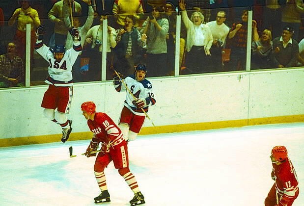 1980 Olympic Winter games, Winterspiele,Spiele, Summer games USA Ice hockey, Eishockey Mark Johnson 10 celebrates scoring a tying goal in the third period with Rob McClanahan of Team USA against the USSR in the Men s Ice Hockey semi-final at the 1980 Olympic Winter Games. Lake Placid New York United States Copyright: xPaulxJxSutton DUOMO PCNx IH0101_106190