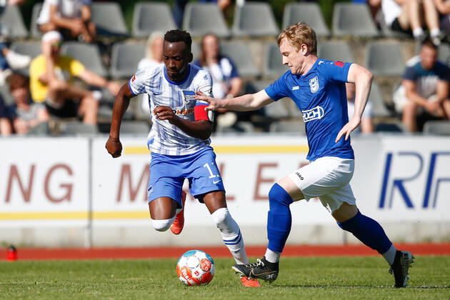 07 07 2021, xtgx, football test match, MSV Neuruppin Hertha BSC Berlin emspor, v l Dodi Lukebakio Hertha, 11 , Robin Hink Neuruppin, 15 duel, duel, fight, tackle DFL DFB REGULATIONS PROHIBIT ANY USE OF PHOTOGRAPHS as IMAGE SEQUENCES and or QUASI VIDEO Neuruppin