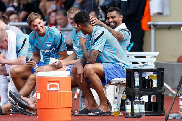 07 07 2021, xtgx, football test match, MSV Neuruppin Hertha BSC Berlin emspor, v l Niklas Stark Hertha, 5 , Marton Dardai Hertha, 31 , Kevin Prince Boateng Hertha, 27 and Davie Selke Hertha, 7 joking on the bench DFL DFB REGULATES PROHIBIT ANY USE OF PHOTOGRAPHS as IMAGE SEQUENCES and or QUASI VIDEO Neuruppin