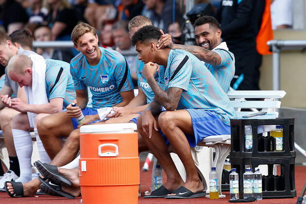 07 07 2021, xtgx, football test match, MSV Neuruppin Hertha BSC Berlin emspor, v l Niklas Stark Hertha, 5 , Marton Dardai Hertha, 31 , Kevin Prince Boateng Hertha, 27 and Davie Selke Hertha, 7 joking on the bench DFL DFB REGULATES PROHIBIT ANY USE OF PHOTOGRAPHS as IMAGE SEQUENCES and or QUASI VIDEO Neuruppin