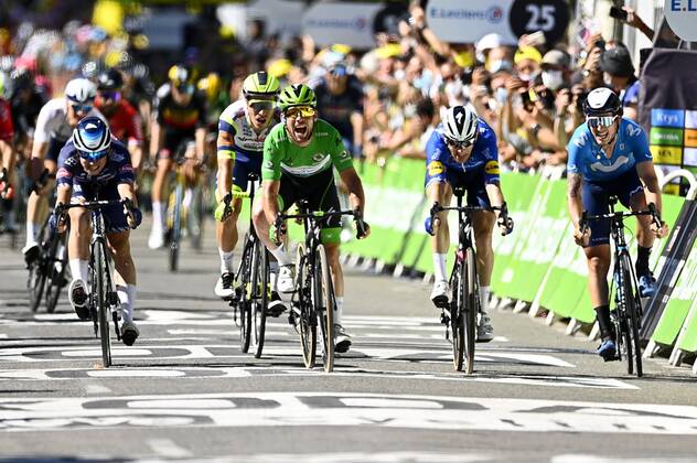CARCASSONNE, FRANCE - JULY 09 : CAVENDISH Mark (GBR) of DECEUNINCK - QUICK-STEP wins the sprint before MORKOV Michael (DEN) of DECEUNINCK - QUICK-STEP and PHILIPSEN Jasper (BEL) of ALPECIN-FENIX during stage 13 of the 108th edition of the 2021 Tour de France cycling race, a stage of 219,9 kms between Nimes and Carcassonne. on July 9, 2021 in Carcassonne, France, 9 07 2021 CYCLISME : Tour de France 2021 - Etape 13 - Nimes to Carcassonne - 09 07 2021 PHOTONEWS PANORAMIC