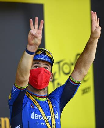CARCASSONNE, FRANCE - JULY 09 : CAVENDISH Mark (GBR) of DECEUNINCK - QUICK - STEP pictured during the podium ceremony during stage 13 of the 108th edition of the 2021 Tour de France cycling race, a stage of 219,9 kms between Nimes and Carcassonne. on July 9, 2021 in Carcassonne, France, 9 07 2021 CYCLISME : Tour de France 2021 - Etape 13 - Nimes to Carcassonne - 09 07 2021 PHOTONEWS PANORAMIC