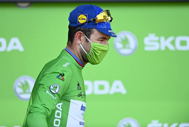 CARCASSONNE, FRANCE - JULY 09 : CAVENDISH Mark (GBR) of DECEUNINCK - QUICK - STEP pictured with the green jersey during the podium ceremony during stage 13 of the 108th edition of the 2021 Tour de France cycling race, a stage of 219,9 kms between Nimes and Carcassonne. on July 9, 2021 in Carcassonne, France, 9 07 2021 CYCLISME : Tour de France 2021 - Etape 13 - Nimes to Carcassonne - 09 07 2021 PHOTONEWS PANORAMIC