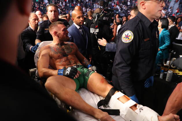 UFC 264, T-Mobile Arena, Las Vegas, Nevada, USA 10 7 2021 Dustin Poirier vs Conor McGregor Conor McGregor leaves the cage on a stretcher after injuring his ankle Conor McGregor leaves the cage on a stretcher after injuring his ankle 10 7 2021  Copyright: x INPHO TomxHoganx UFC264_543_Hoganphotos