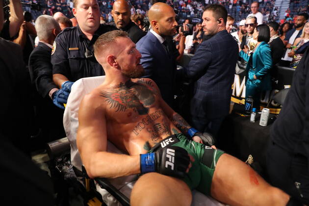 UFC 264, T-Mobile Arena, Las Vegas, Nevada, USA 10 7 2021 Dustin Poirier vs Conor McGregor Conor McGregor leaves the cage on a stretcher after injuring his ankle Conor McGregor leaves the cage on a stretcher after injuring his ankle 10 7 2021  Copyright: x INPHO TomxHoganx UFC264_544_Hoganphotos