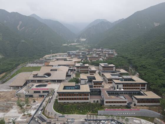 (210718) -- BEIJING, July 18, 2021 -- Aerial photo taken on July 15, 2021 shows the athletes village for Beijing 2022 Olympic and Paralympic Winter games, Winterspiele,Spiele, Summer games in Beijing s northwestern Yanqing district, China. ) Xinhua Headlines: Countdown to Beijing 2022 Organizers shaping up for final preparations with 200 days to go XiaxZilin 