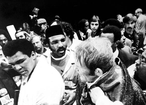 Muhammad Ali is declared the victor after a bloody heavyweight battle with Henry Cooper in London, England., Muhammad Ali, Henry Cooper Wembley Stadium, London, UK, Ref:VM SPO Muhammad Ali Richard Dunn 3.jpg, Muhammad Ali, Henry Cooper, boxing, heavyweight, knockout, blood, Wembley Stadium, London, UK Copyright: xVarleyxMedia x