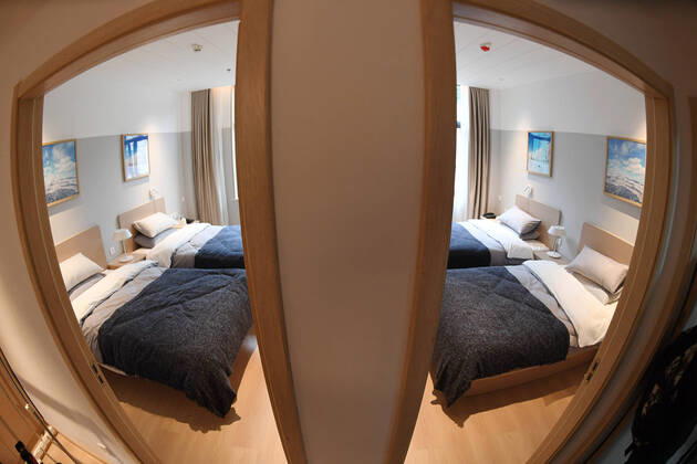 200820 -- BEIJING, Aug. 20, 2020 -- Photo taken on Aug. 20, 2020 shows sample rooms for athletes in the Yanqing Olympic Paralympic Village in suburban Yanqing District of Beijing, capital of China. The Yanqing Olympic Paralympic Village of the 2022 Beijing Winter Olympics will be fully completed by the end of this year as planned, and will meet the requirements for hosting events in August 2021. The Village is designed for atheletes with the concept of athlete-centered , highlighting the Chinese cultural characteristics and ecological conservation. After the Games, it will be opened to the public as a leisure resort. SPCHINA-BEIJING-2022 WINTER OLYMPICS-YANQING WINTER OLYMPIC VILLAGECN ZhangxChenlin (200820) -- BEIJING, Aug. 20, 2020 -- Photo taken on Aug. 20, 2020 shows sample rooms for athletes in the Yanqing Olympi ZhangxChenlinxviaxwww.imago-images.de imago images 103218281