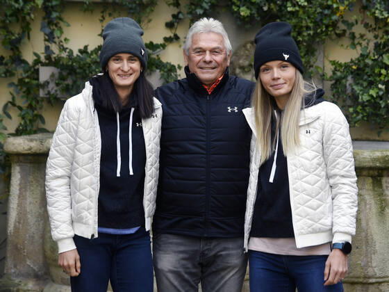 Czech speed skaters Martina Sablikova, left, and Nikola Zdrahalova, right, pose with their coach Petr Novak, center, after a press conference, PK, Pressekonferenz before new season, on November 1, 2021, in Prague, Czech Republic. (CTKxPhoto MichaelaxRihova) CTKPhotoP2021110103004  mir 6
