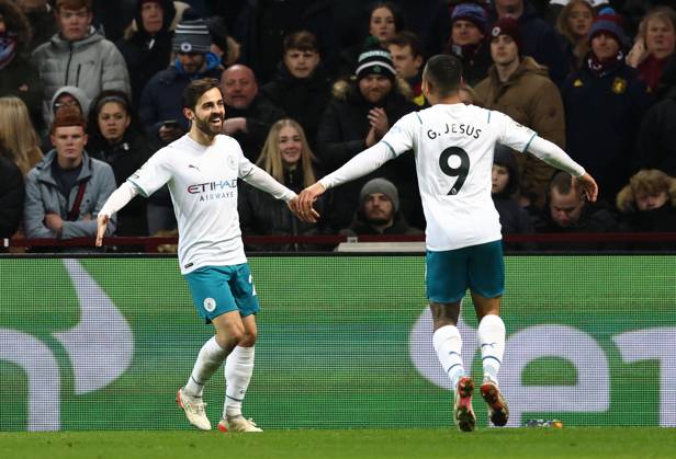 Birmingham, England, 1st December 2021. Bernardo Silva of Manchester City (l) celebrates scoring their second goal during the Premier League match at Villa Park, Birmingham. Picture credit should read: Darren Staples Sportimage EDITORIAL USE ONLY. No use with unauthorised audio, video, data, fixture lists, club league logos or live services. Online in-match use limited to 120 images, no video emulation. No use in betting, games or single club league player publications. SPI-1370-0026