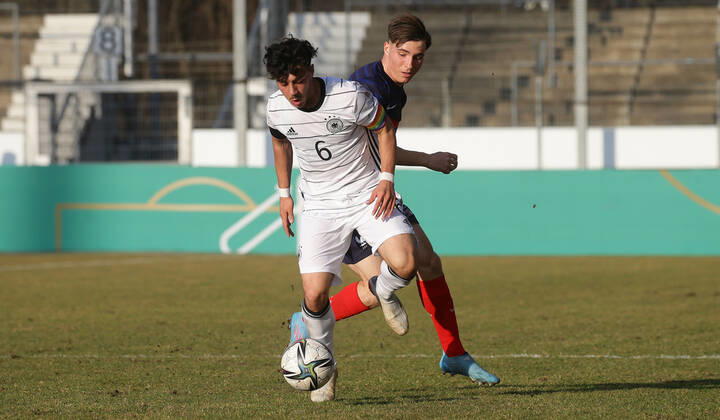 Stuttgart , Soccer U18 international match Germany vs France , from front Umut Tohumcu GER Hugo Vogel FRA