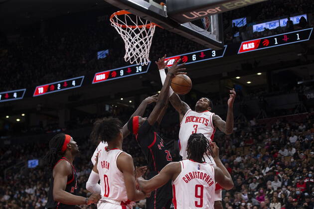 April 8, 2022, Toronto, ON, CAN: Houston Rockets Kevin Porter Jr. (3) goes to the hoop as Toronto Raptors forward Chris Boucher defends during first half NBA, Basketball Herren, USA basketball action in Toronto on Friday, April 8, 2022. Canada News - April 8, 2022  - ZUMAc35_ 20220408_zaf_c35_086 Copyright: xChrisxYoungx