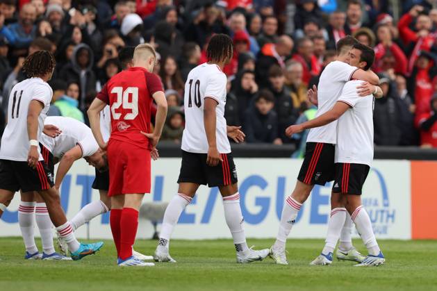 Nyon, Switzerland, 25th April 2022. Henrique Araujo of SL Benfica celebrates with team mates after scoring to give the side a 2-0 lead during the UEFA Youth League match at Colovray Sports Centre, Nyon. Picture credit should read: Jonathan Moscrop Sportimage EDITORIAL USE ONLY. No use with unauthorised audio, video, data, fixture lists, club league logos or live services. Online in-match use limited to 120 images, no video emulation. No use in betting, games or single club league player publications. SPI-1659