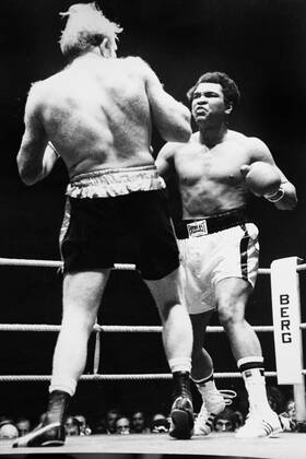 Muhammad Ali is declared the victor after a bloody heavyweight battle with Henry Cooper in London, England., Muhammad Ali, Henry Cooper Wembley Stadium, London, UK, VM SPO Muhammad Ali Richard Dunn 5.jpg, Muhammad Ali, Henry Cooper, boxing, heavyweight, knockout, blood, Wembley Stadium, London, UK Copyright: xVarleyxMedia x