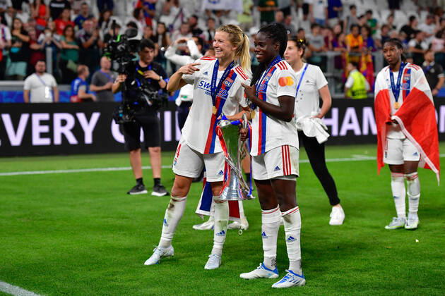 FC Barcelona, Barca v Olympique Lyon, UEFA Women?s Champions League final, football, Turin, Italy Turin, Italy. 21st, May 2022. Ada Hegerberg (14) and Mbock Bathy (29) of Olympique Lyon is celebrating and seen with the Champions League trophy after the UEFA Women?s Champions League final between Barcelona and Olympique Lyon at Juventus Stadium in Turin. Turin Italy Copyright: xGonzalesxPhoto TommasoxFimianox