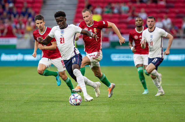 Hungary v England: UEFA Nations League - League Path Group 3 Bukayo Saka of England competes for the ball with Adam Lang of Hungary during the UEFA Nations League A3 match at Puskas ArÃ na on June 04, 2022 in Budapest, Hungary. Budapest Hungary  Copyright: xRobertxSzaniszlox originalFilename:szaniszlo-notitle220604_npUpz