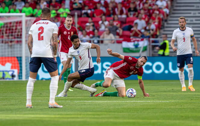 Hungary v England: UEFA Nations League - League Path Group 3 Adam Szalai of Hungary competes for the ball with Jude Bellingham of England during the UEFA Nations League A3 match at Puskas ArÃ na on June 04, 2022 in Budapest, Hungary. Budapest Hungary  Copyright: xRobertxSzaniszlox originalFilename:szaniszlo-notitle220604_np1SL