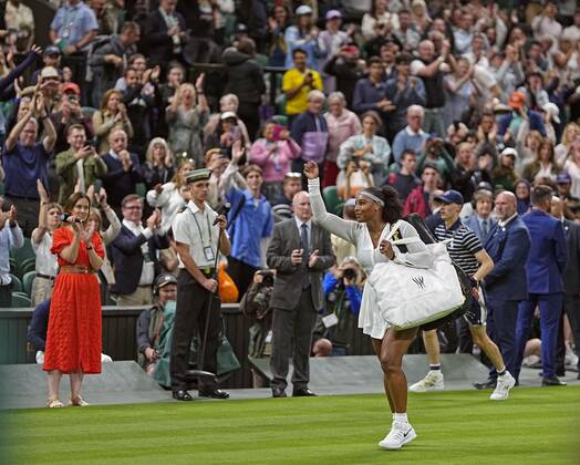 Tennis: Wimbledon championships Serena Williams of the United States acknowledges spectators as she leaves the court after being defeated by Harmony Tan of France in the first round of the Wimbledon tennis tournament in London on June 28, 2022.  A14AA0001307378P