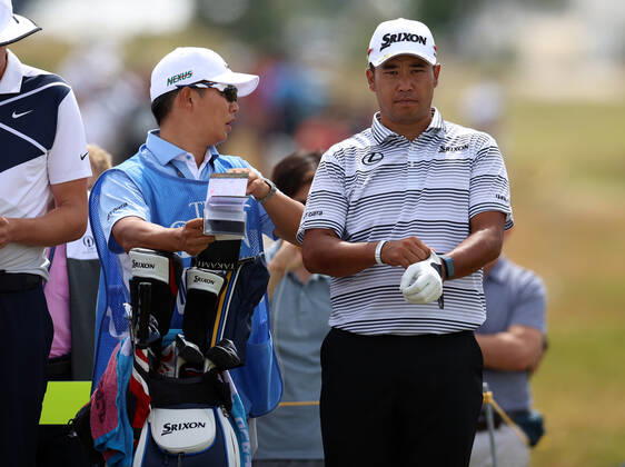 11th July 2022, Old Course at St Andrews, St Andrews, Fife, Scotland; The Open Golf Championship pre-tournament activities; Hideki Matsuyama (JAP) consults with his caddie on the 2nd tee  ActionPlus12407487 DavidxBlunsden