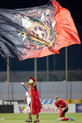 TA QALI, MALTA - 14 JULY 2022 A Hamrun Spartans mascot clad in a Spartan tunic shows off the Hamrun flag after the First qualifying round, 2nd leg soccer match, from the UEFA Europa Conference League between Hamrun Spartans and Alashkert at the Centenary Stadium, Ta Qali, Malta on 14 July 2022. Hamrun Spartans won 4-1 to advance further in the competition. Photo Domenic Aquilina Hamrun Spartans FC (MLT) v Alashkert FC (ARM) UECL_22_23
