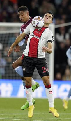 Birmingham, England, 16th September 2022. Jacob Ramsey of Aston Villa challenges Mohamed Elyounoussi of Southampton during the Premier League match at Villa Park, Birmingham. Picture credit should read: Andrew Yates Sportimage EDITORIAL USE ONLY. No use with unauthorised audio, video, data, fixture lists, club league logos or live services. Online in-match use limited to 120 images, no video emulation. No use in betting, games or single club league player publications. SPI-1879-0016