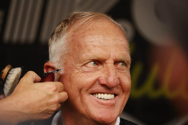 SUGAR GROVE, IL - SEPTEMBER 17: Greg Norman the LIV CEO and golf commissioner gets a mullet hair cut for charity after the second round of the LIV Golf Invitational Series Chicago on September 17, 2022 at Rich Harvest Farms in Sugar Grove, Illinois. (Photo by Brian Spurlock Icon Sportswire) GOLF: SEP 17 LIV Golf Invitational Series Chicago Icon220917052