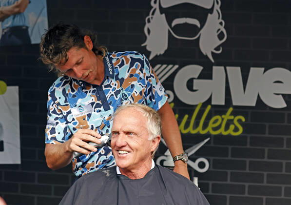 SUGAR GROVE, IL - SEPTEMBER 17: LIV golfer Cameron Smith gives Greg Norman the LIV CEO and golf commissioner a mullet hair cut for charity after the second round of the LIV Golf Invitational Series Chicago on September 17, 2022 at Rich Harvest Farms in Sugar Grove, Illinois. (Photo by Brian Spurlock Icon Sportswire) GOLF: SEP 17 LIV Golf Invitational Series Chicago Icon220917095
