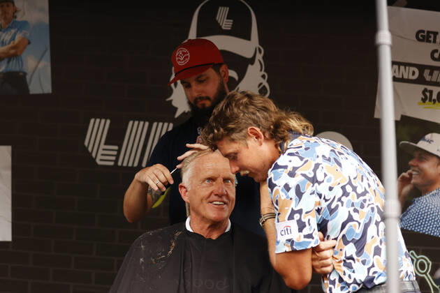 SUGAR GROVE, IL - SEPTEMBER 17: LIV golfer Cameron Smith talks with Greg Norman the LIV CEO and golf commissioner as Norman gets a mullet hair cut for charity after the second round of the LIV Golf Invitational Series Chicago on September 17, 2022 at Rich Harvest Farms in Sugar Grove, Illinois. (Photo by Brian Spurlock Icon Sportswire) GOLF: SEP 17 LIV Golf Invitational Series Chicago Icon220917099