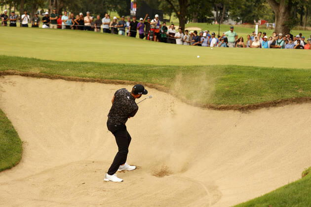 SUGAR GROVE, IL - SEPTEMBER 17: LIV golfer Dustin Johnson hits his second shot out of the sand on the 12th hole during the second round of the LIV Golf Invitational Series Chicago on September 17, 2022 at Rich Harvest Farms in Sugar Grove, Illinois. (Photo by Brian Spurlock Icon Sportswire) GOLF: SEP 17 LIV Golf Invitational Series Chicago Icon220917143