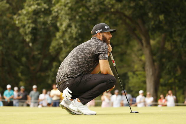 SUGAR GROVE, IL - SEPTEMBER 17: LIV golfer Dustin Johnson lines up a putt on the 12th hole during the second round of the LIV Golf Invitational Series Chicago on September 17, 2022 at Rich Harvest Farms in Sugar Grove, Illinois. (Photo by Brian Spurlock Icon Sportswire) GOLF: SEP 17 LIV Golf Invitational Series Chicago Icon220917180