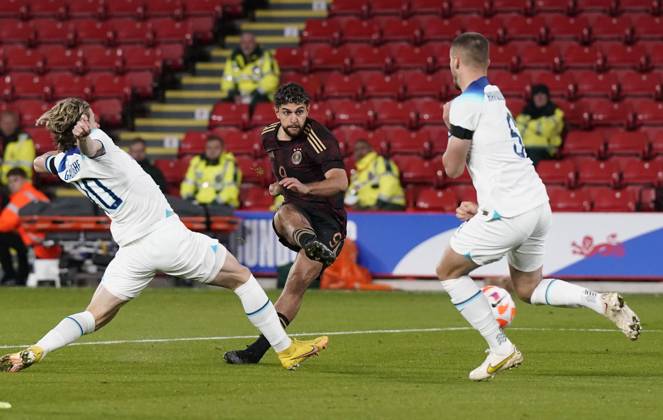 Sheffield, England, 27th September 2022. Reda Khadra of Germany takes a shot on goal during the International Friendly, Länderspiel, Nationalmannschaft match at Bramall Lane, Sheffield. Picture credit should read: Andrew Yates Sportimage EDITORIAL USE ONLY. No use with unauthorised audio, video, data, fixture lists, club league logos or live services. Online in-match use limited to 120 images, no video emulation. No use in betting, games or single club league player publications. SPI-1910-0022