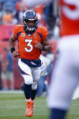 DENVER, CO - OCTOBER 06: Denver Broncos Quarterback Russell Wilson (3) runs onto the field during and NFL, American Football Herren, USA game between the Indianapolis Colts and the Denver Broncos on October 06, 2022 at Empower Field at Mile High in Denver CO. (Photo by Jeffrey Brown Icon Sportswire) NFL: OCT 06 Colts at Broncos Icon100622024