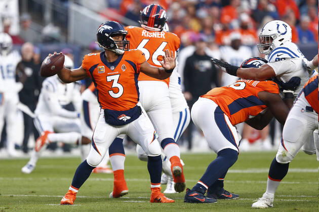 DENVER, CO - OCTOBER 06: Denver Broncos Quarterback Russell Wilson (3) drops back to pass during and NFL, American Football Herren, USA game between the Indianapolis Colts and the Denver Broncos on October 06, 2022 at Empower Field at Mile High in Denver CO. (Photo by Jeffrey Brown Icon Sportswire) NFL: OCT 06 Colts at Broncos Icon100622026