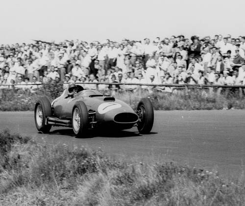 Nuerburgring Grand Prix of Germany 04 08 1957 Peter Collins in Ferrari 801 in action In the background the spectators separated from the race track only by a wooden fence HM