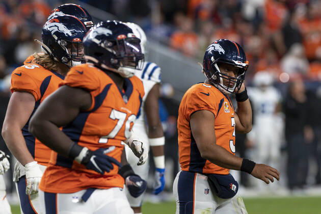 DENVER, CO - OCTOBER 06: Denver Broncos quarterback Russell Wilson (3) walks off the field during an NFL, American Football Herren, USA game between the Indianapolis Colts and the Denver Broncos at Empower Field at Mile High on October 06, 2022 in Denver, Colorado. (Photo by Brandon Sloter Icon Sportswire) NFL: OCT 06 Colts at Broncos Icon221006164