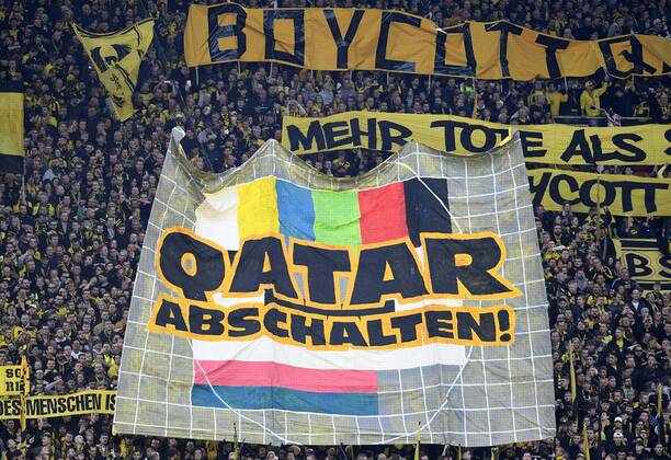 05 11 2022, Dortmund, Germany, Signal Iduna Park, BV Borussia Dortmund vs VfL Bochum 1 Bundesliga, Fans Borussia Dortmund with banner Qatar shut down Photo Ralf Treese DFB DFL REGULATES PROHIBIT ANY USE OF PHOTOGRAPHS AS IMAGE SEQUENCES AND OR QUASI VIDEO Dortmund Signal Iduna Park North Rhine Westphalia Germany  521_BVBBOC20221105_027 Treese-521