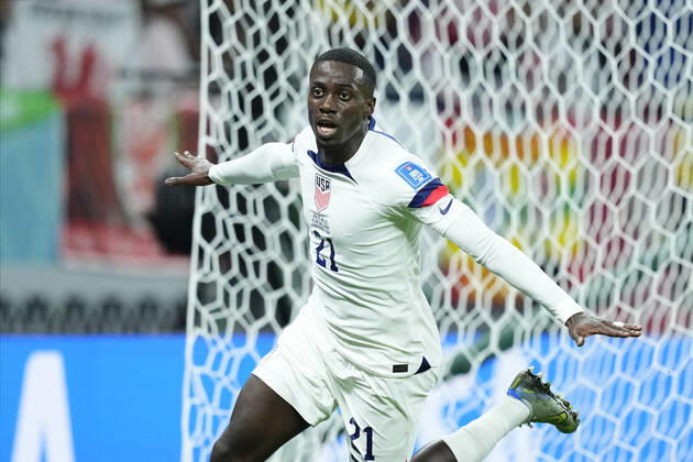 USA v Wales: Group B - FIFA World Cup, WM, Weltmeisterschaft, Fussball Qatar 2022 Timothy Weah Centre-Forward of USA and LOSC Lille celebrates after scoring his sides first goal during the FIFA World Cup Qatar 2022 Group B match between USA and Wales at Ahmad Bin Ali Stadium on November 21, 2022 in Doha, Qatar. Doha Qatar Copyright: xJosexBretonx originalFilename:breton-usavwale221121_nphdt