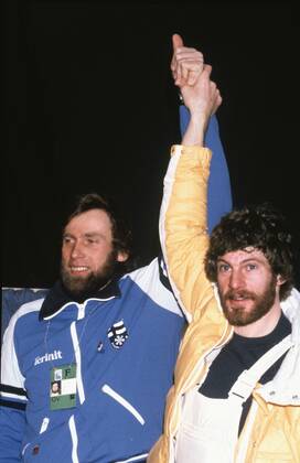 Winter Olympics Lake Placid 1980 Juha Mieto tv , Finland, raises Thomas Wassbergs arm after Wassberg won the 15 km gold medal by a hundredth of a second ahead of Mieto LAKE PLACID UNITED STATES PB KOD 200 x417x  Copyright: xEPUx OS LAKE PLACID 1980 WASSBERG