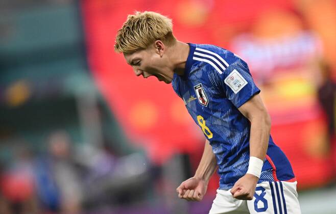 Russia Soccer World Cup Japan - Spain 8329422 01.12.2022 Japan s Ritsu Doan celebrates the team s goal during the Qatar 2022 World Cup Group E soccer match between Japan and Spain, in Doha, Qatar. Grigory Sysoev Sputnik Doha Qatar  Copyright: xGrigoryxSysoevx