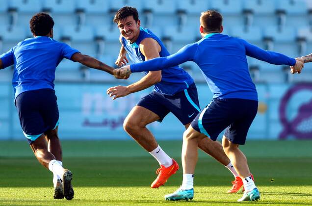 Mandatory Credit: Photo by Kieran McManus Shutterstock (13646879at) Harry Maguire of England is chased by team mates during a game of Kabaddi England Training, FIFA World Cup, WM, Weltmeisterschaft, Fussball 2022, Football, Al Wakrah Sports Complex, Al Wakrah, Qatar - 03 Dec 2022 Editorial Use Only England Training, FIFA World Cup 2022, Football, Al Wakrah Sports Complex, Al Wakrah, Qatar - 03 Dec 2022 Editorial Use Only  Copyright: xKieranxMcManus Shutterstockx 13646879at