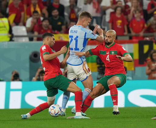 QAT, World Cup FIFA 2022, Round of 16, Morocco vs Spain 06 12 2022, Education City Stadium, Doha, QAT, World Cup FIFA 2022, Round of 16, Morocco vs Spain, pictured Morocco s defender Achraf Hakimi , Spain™s forward Dani Olmo , Morocco s midfielder Sofyan Amrabat. nordphotoxGmbHx xBratic nph00250