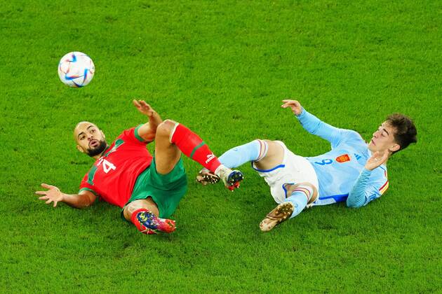 Mandatory Credit: Photo by Javier Garcia Shutterstock (13651659y) Gavi of Spain challenges Sofyan Amrabat of Morocco. Morocco v Spain, FIFA World Cup, WM, Weltmeisterschaft, Fussball 2022, Round of 16, Football, Education City Stadium, Doha, Qatar - 06 Dec 2022 Editorial Use Only Morocco v Spain, FIFA World Cup 2022, Round of 16, Football, Education City Stadium, Doha, Qatar - 06 Dec 2022 Editorial Use Only  Copyright: xJavierxGarcia Shutterstockx 13651659y