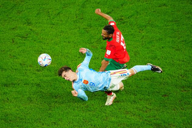 Mandatory Credit: Photo by Javier Garcia Shutterstock (13651659ac) Gavi of Spain wins a header from Sofiane Boufal of Morocco. Morocco v Spain, FIFA World Cup, WM, Weltmeisterschaft, Fussball 2022, Round of 16, Football, Education City Stadium, Doha, Qatar - 06 Dec 2022 Editorial Use Only Morocco v Spain, FIFA World Cup 2022, Round of 16, Football, Education City Stadium, Doha, Qatar - 06 Dec 2022 Editorial Use Only  Copyright: xJavierxGarcia Shutterstockx 13651659ac