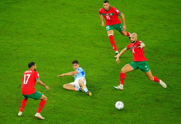 Mandatory Credit: Photo by Javier Garcia Shutterstock (13651659ag) Pedri of Spain is surrounded by Sofiane Boufal of Morocco, Selim Amallah of Morocco and Sofyan Amrabat of Morocco Morocco v Spain, FIFA World Cup, WM, Weltmeisterschaft, Fussball 2022, Round of 16, Football, Education City Stadium, Doha, Qatar - 06 Dec 2022 Editorial Use Only Morocco v Spain, FIFA World Cup 2022, Round of 16, Football, Education City Stadium, Doha, Qatar - 06 Dec 2022 Editorial Use Only  Copyright: xJavierxGarcia Shutterstockx 13651659ag