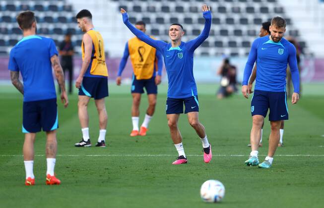 Mandatory Credit: Photo by Kieran McManus Shutterstock (13658574r) Phil Foden of England puts his hands up during training England Training and press conference, PK, Pressekonferenz FIFA World Cup, WM, Weltmeisterschaft, Fussball 2022, Football, Al Wakrah Sports Complex, Al Wakrah, Qatar - 09 Dec 2022 Editorial Use Only England Training and Press Conference, FIFA World Cup 2022, Football, Al Wakrah Sports Complex, Al Wakrah, Qatar - 09 Dec 2022 Editorial Use Only  Copyright: xKieranxMcManus Shutterstockx 13658574r